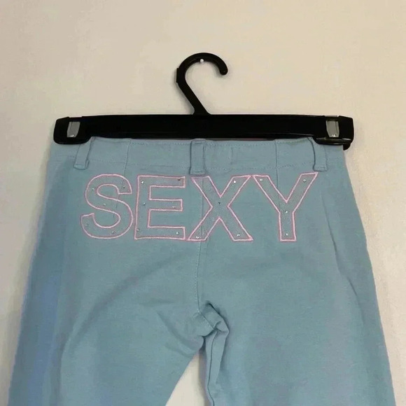 Vintage deadstock light blue bedazzled “sexy” low waisted pants. - Picture 2 of 3